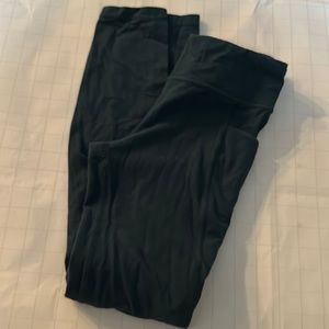 Athleta winter green or teal stash your treasures tight leggings.